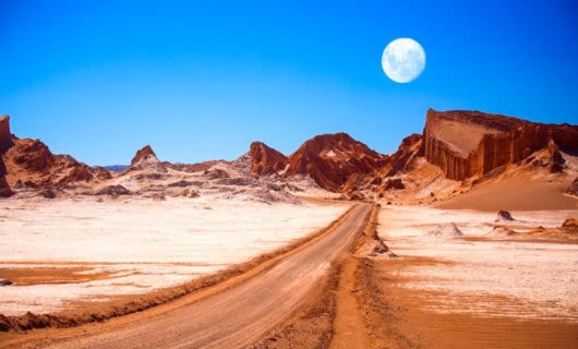 Full moon hangs over Atacama Desert