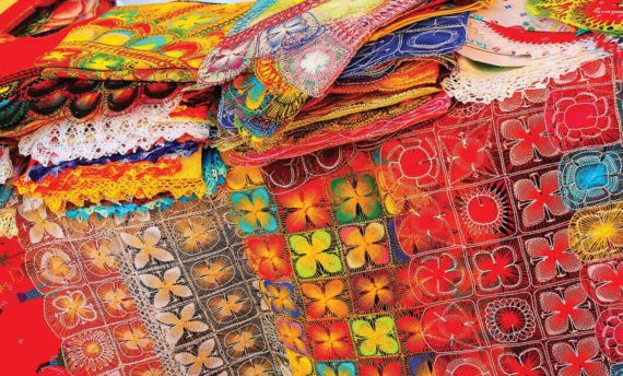 colorful textiles at market in Paraguay
